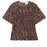 The Smocked Flounce Top