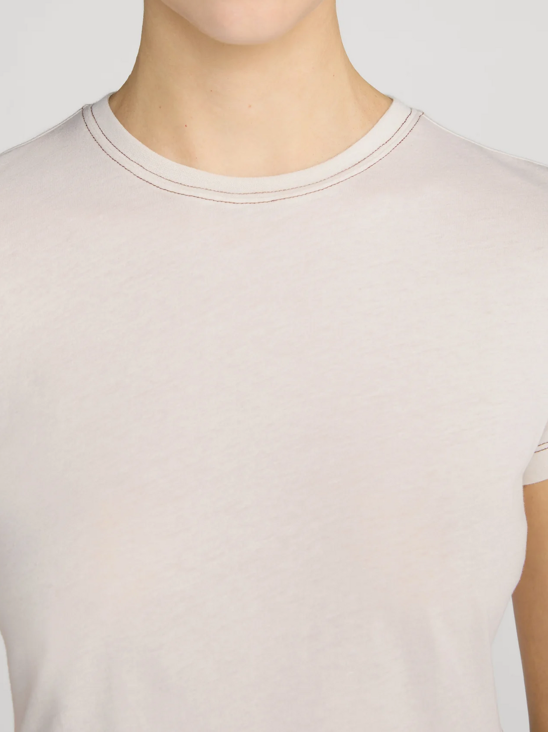 The Contrast Stitch Baby Tee